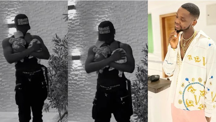 Kizz Daniel finally shows off his adorable twins as they clock a month