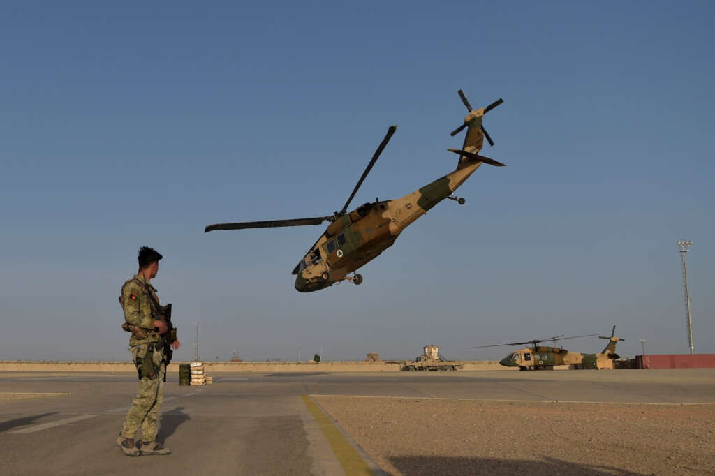 Afghan president fled with cars and helicopter full of cash__ Russia says