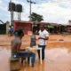 PHOTOS- Imo State Youths cook and demonstrate in muddy water to raise awareness about the terrible state of a road