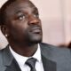 I was happier when I was poor - Akon