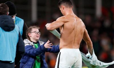 the girl who ran to collect Ronaldo's jersey