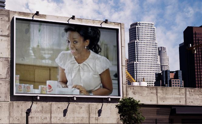 Genevieve in a Luna Milk commercial billboard