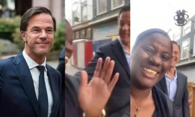 African lady could not believe her eyes as she walk side by side with Netherlands Prime Minister